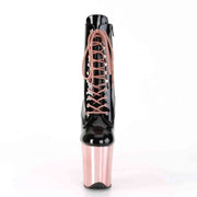 Front view of black and pink high heel boots